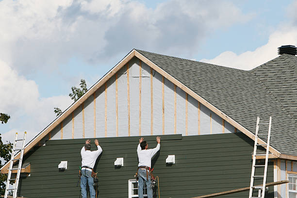 Professional Siding technician working in Round Hill, VA